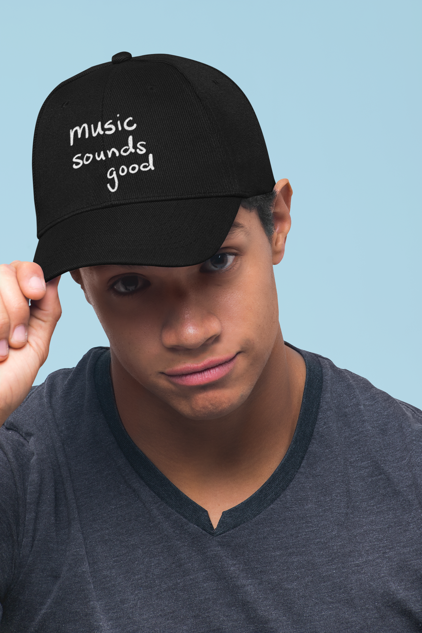 Man wearing music sounds good hat