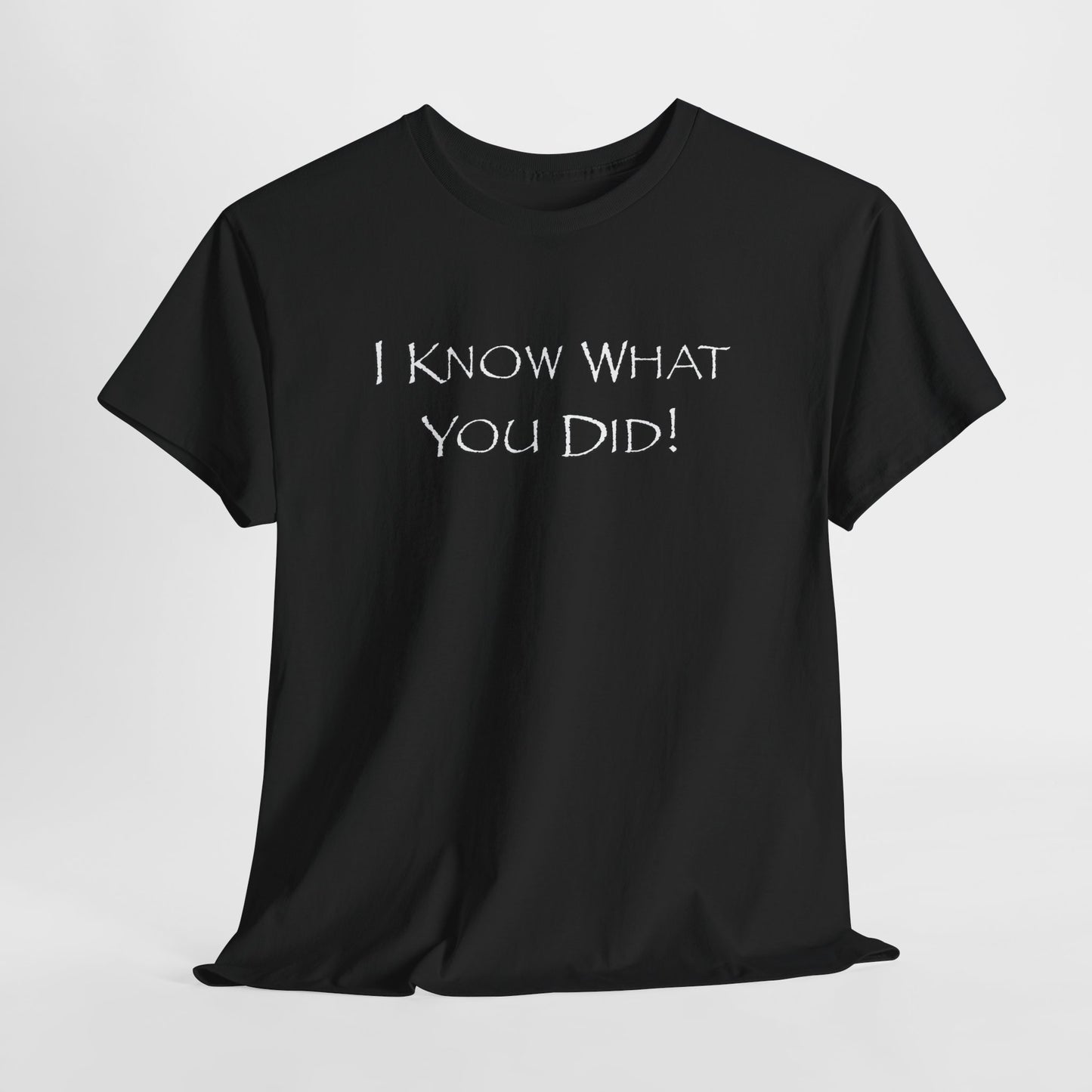 Black t-shirt with text 'I KNOW WHAT YOU DID!' on a light gray background