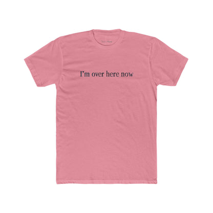 Pink t-shirt with 'I'm over here now' text on a white background