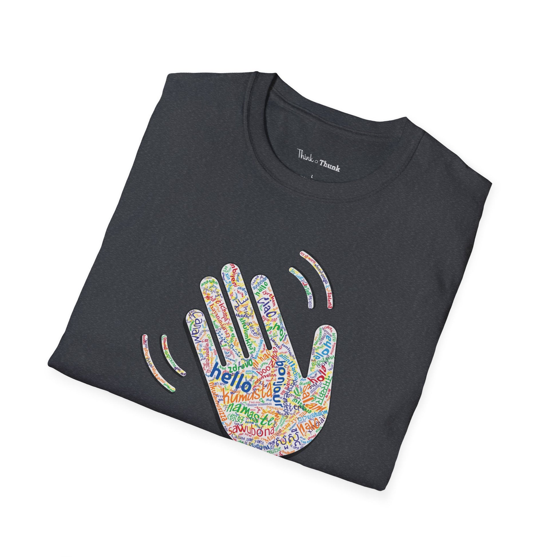 Folded dark gray T-shirt with a colorful hand graphic filled with greetings from many languages - on a white background