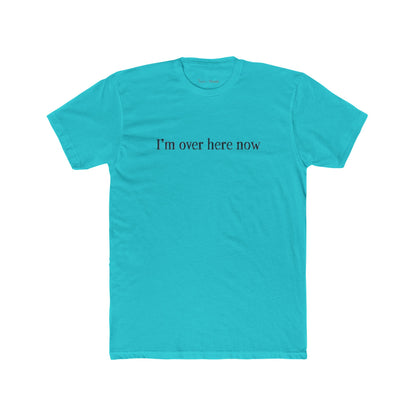 Turquoise t-shirt with 'I'm over here now' text on a white background