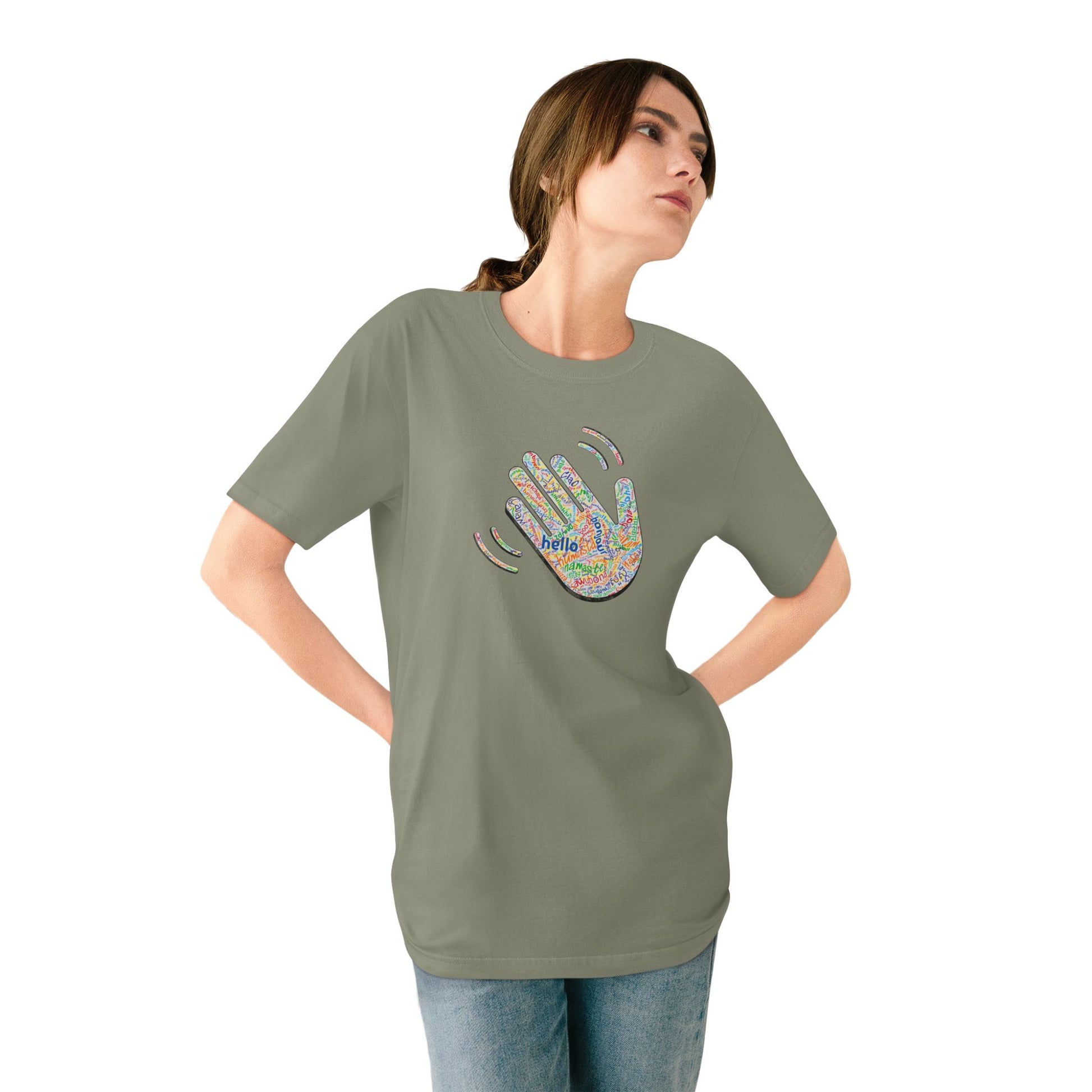 Woman wearing a green t-shirt with a colorful graphic design on a white background