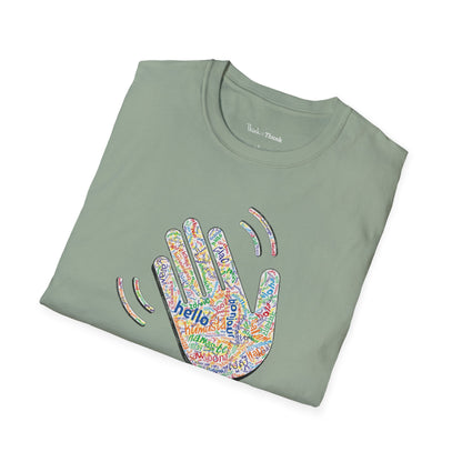 Folded green T-shirt with a colorful hand graphic filled with greetings from many languages - on a white background