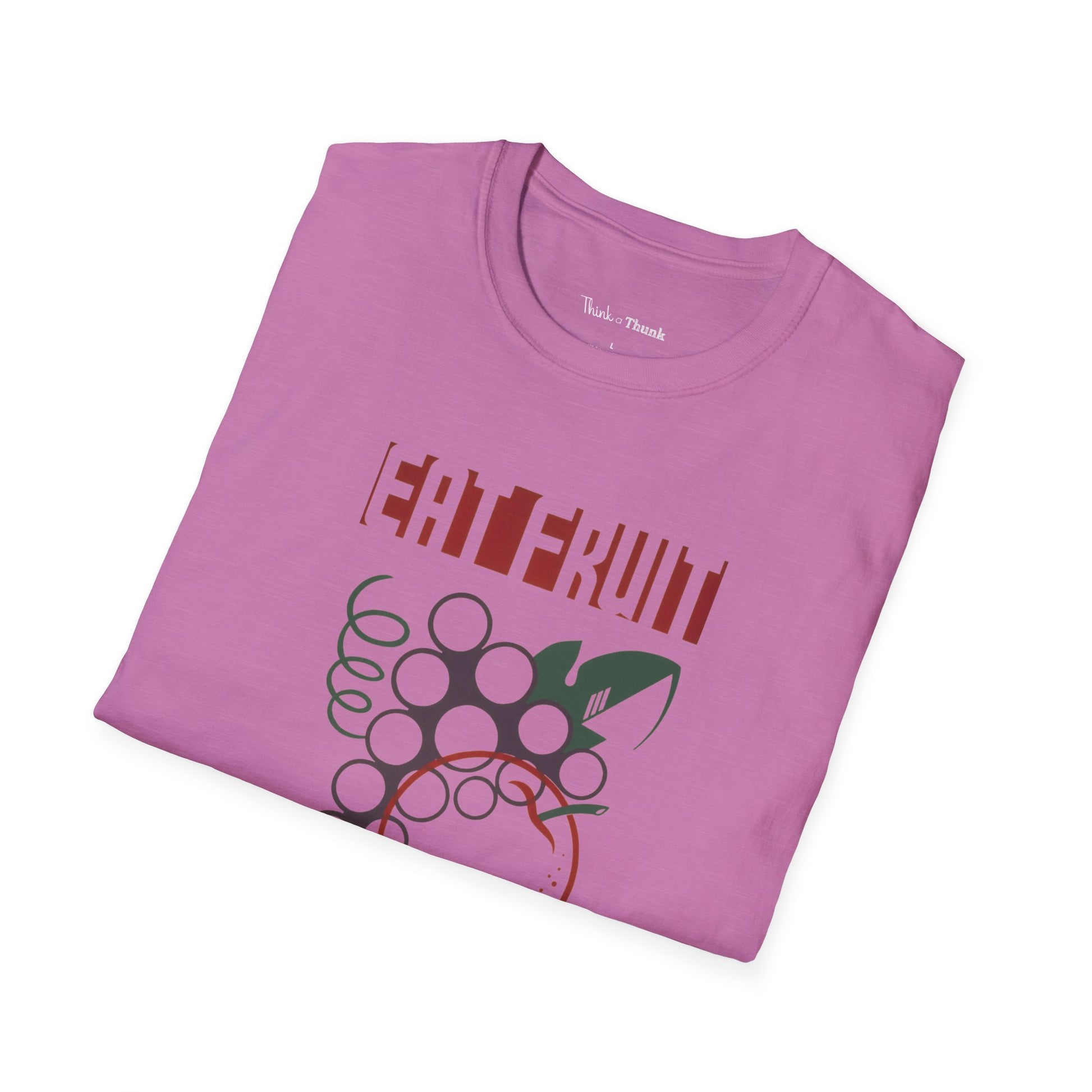 Folded pink t-shirt with 'EAT FRUIT' graphic design on a white background