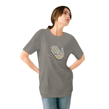 Woman wearing a gray t-shirt with a colorful graphic on a white background