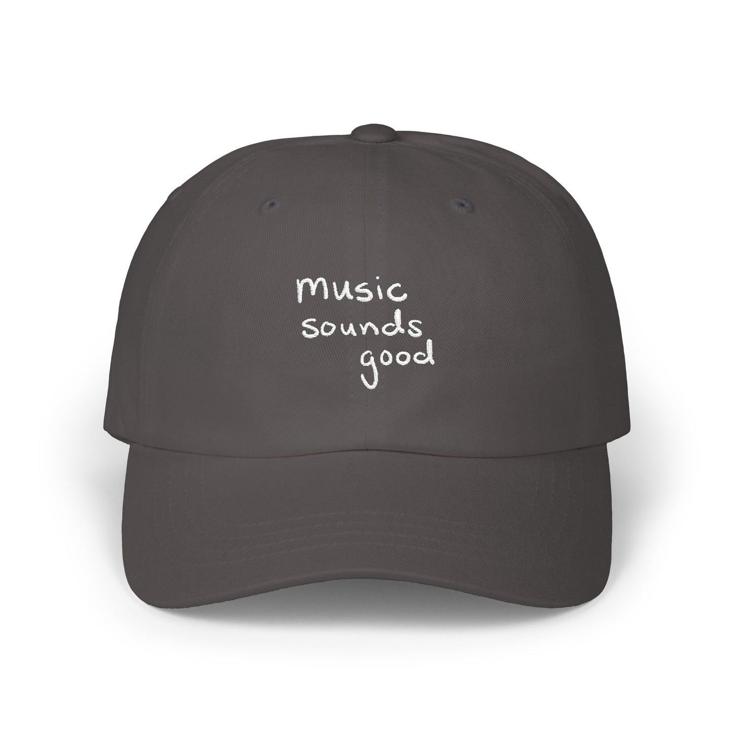 Gray cap with 'music sounds good' text on a white background