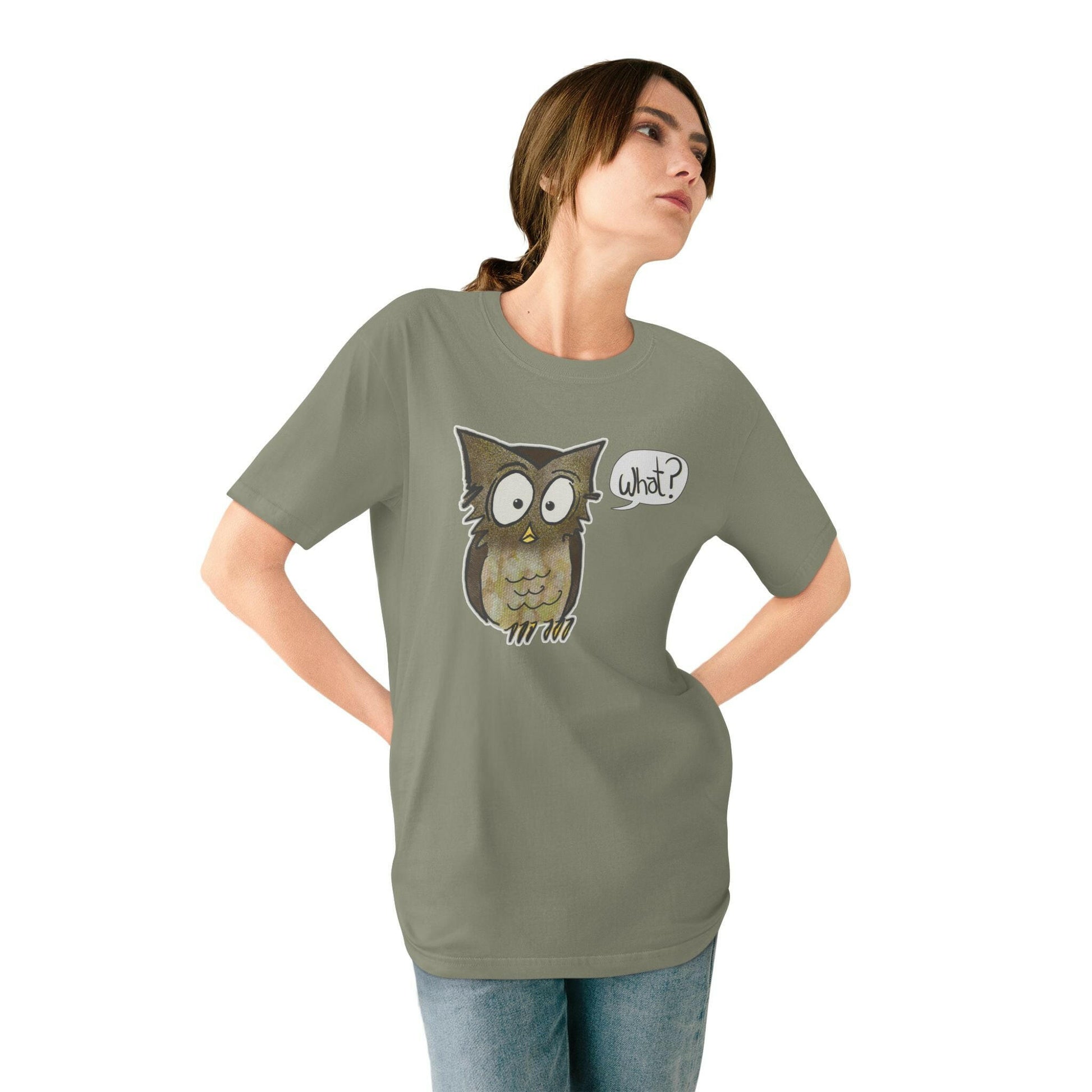 Woman wearing olive green t-shirt with an owl graphic on a white background
