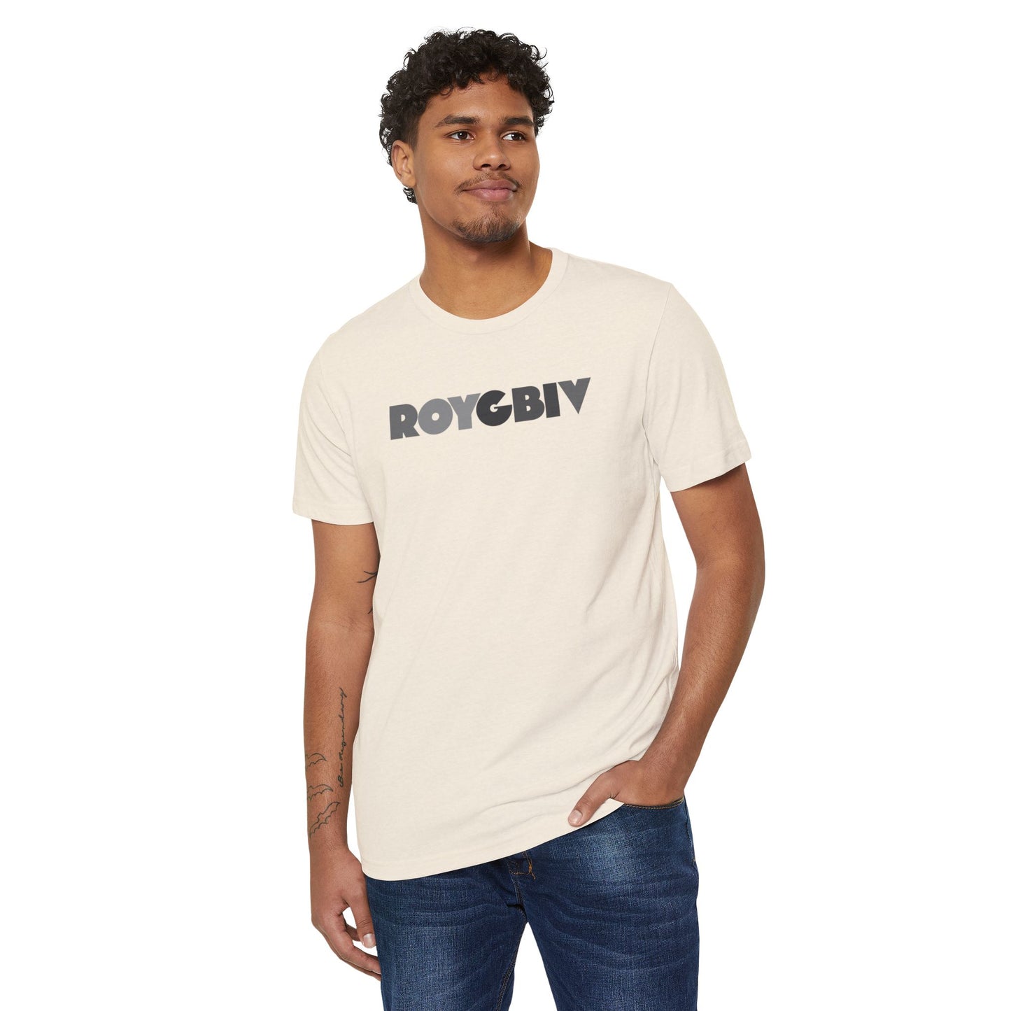 Man wearing a cream t-shirt with 'ROYGBIV' text on a white background