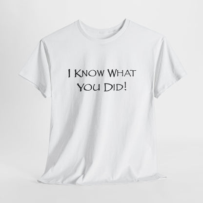 White t-shirt with black text 'I KNOW WHAT YOU DID!' on a light gray background