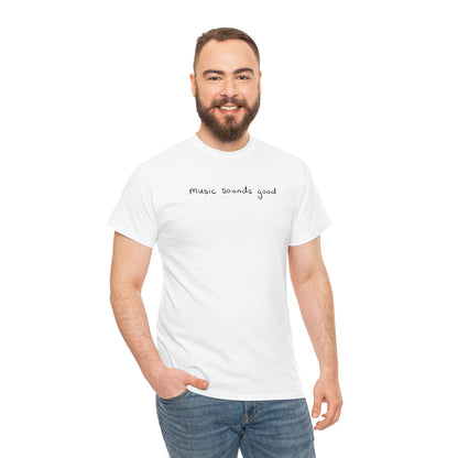 Man wearing a white t-shirt with 'music sounds good' text on a white background