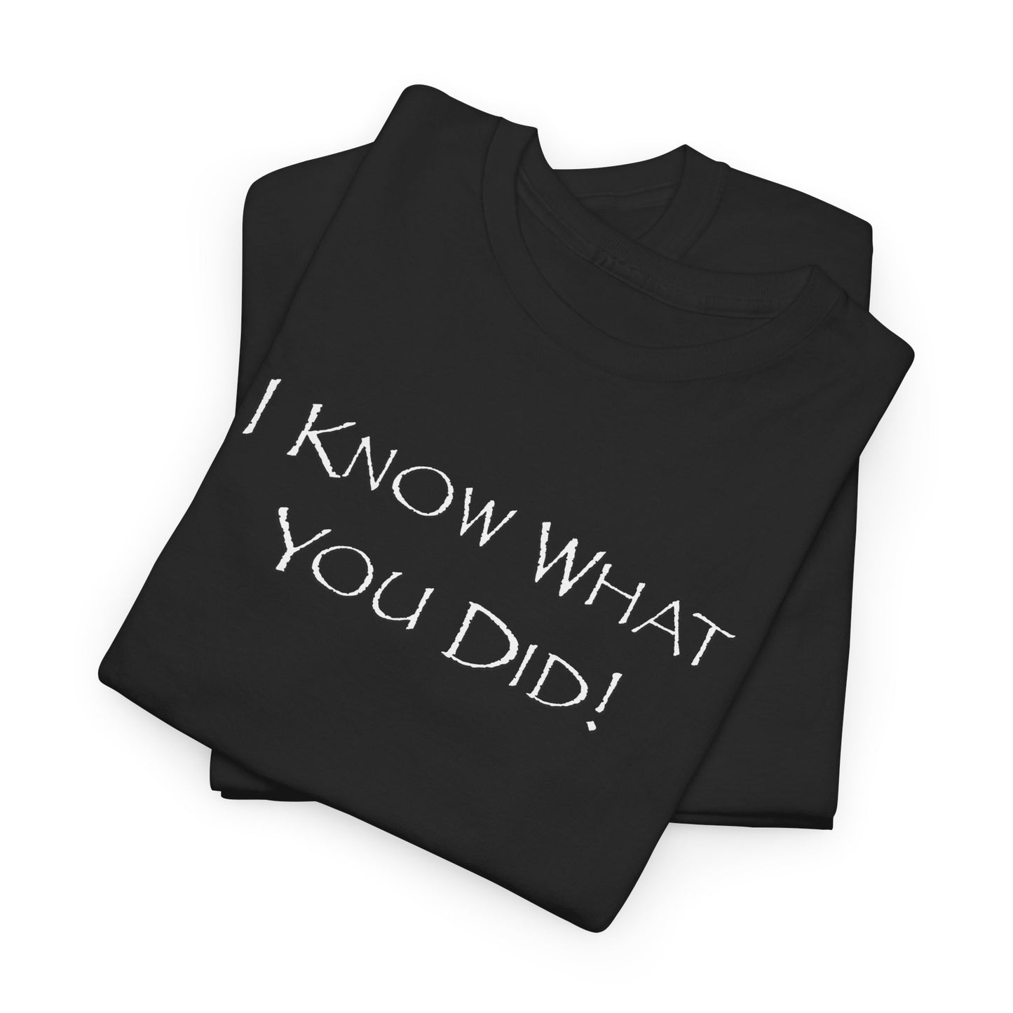 Folded black t-shirt with 'I KNOW WHAT YOU DID!' text on a white background