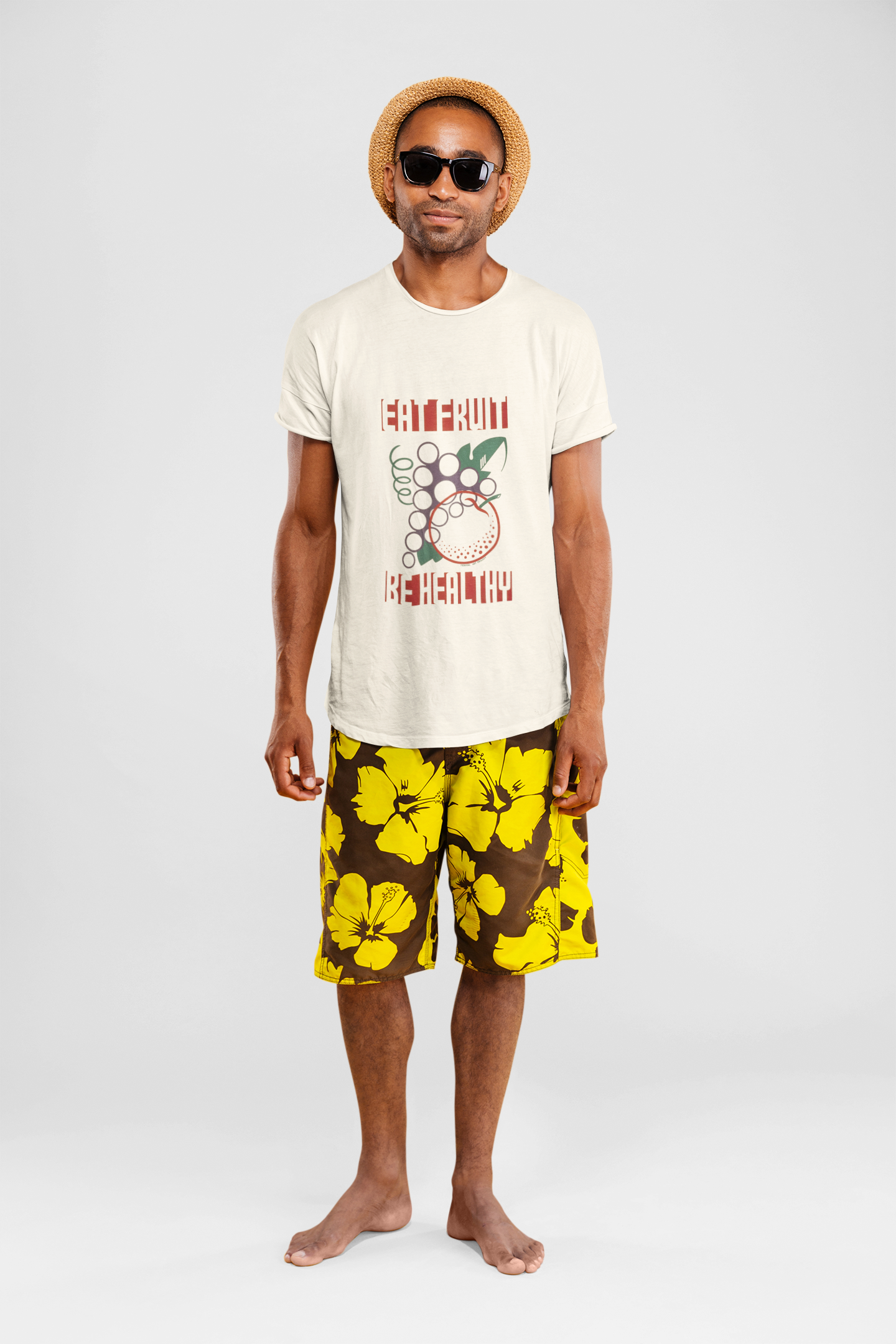 man dressed for the beach wearing a EAT FRUIT BE HEALTHY T-shirt